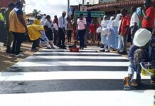 Police Hails Community Volunteers at Zebra Crossings Along Hoima City Streets Enforcing Safety Road Use