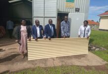 Over 900 Iron Sheets, 30 Sewing Machines Delivered to Hoima, Masindi Districts from OPM.